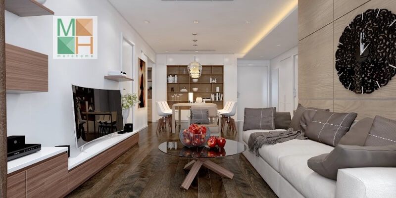 Thiết kế nội thất phòng khách chung cư đẹp với kệ ti vi treo tường kết hợp bộ sofa màu trắng với gối tựa màu ghi tạo điểm nhấn nổi bật cho căn phòng